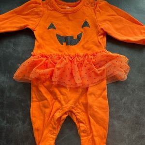 Adorable footed, skirted pumpkin sleep and play